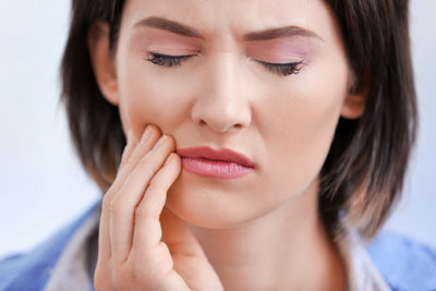 Visit a Dentist in Tucson for Bruxism Treatments and Relief from Pain